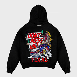 Black hoodie with colorful graphic design on the back featuring text and a car, on a light gray background.